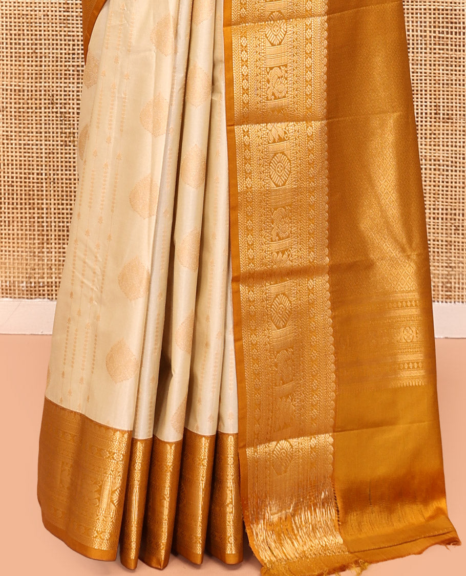 Biscuit-Yellow Budget Silk Saree, Woven with Zari Buttas, Complemented by a Contrast Traditional Zari Border, Grand Jaal Pallu, and a Contrast Blouse