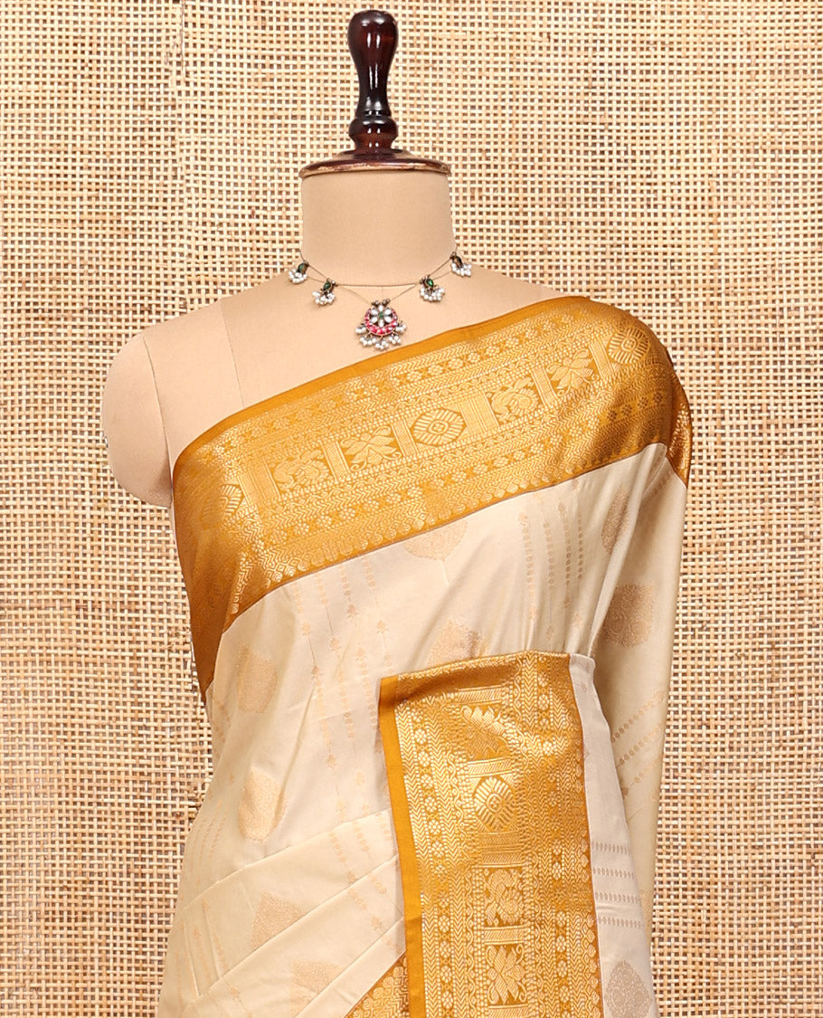Biscuit-Yellow Budget Silk Saree, Woven with Zari Buttas, Complemented by a Contrast Traditional Zari Border, Grand Jaal Pallu, and a Contrast Blouse