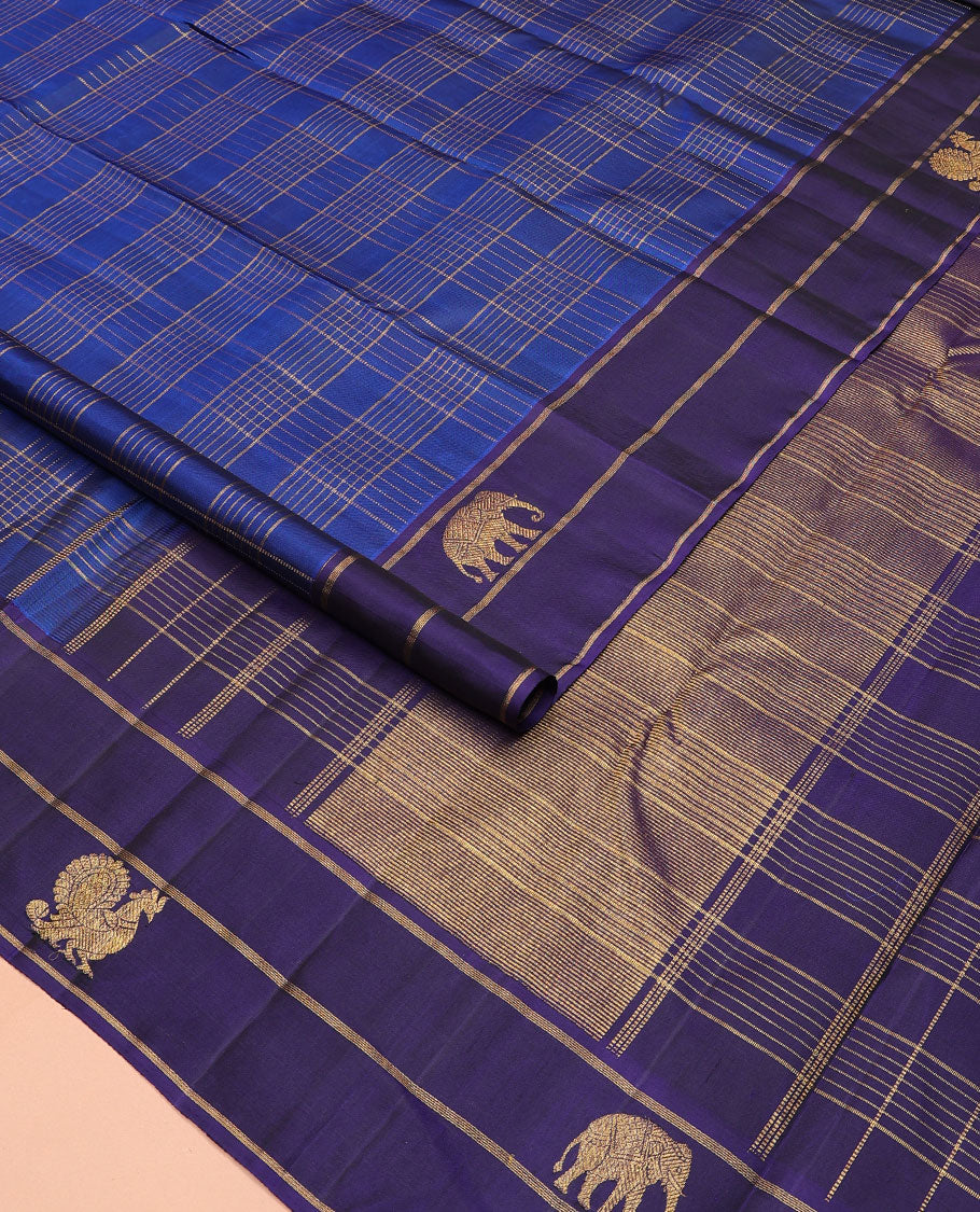 Blue zari checked Kanchipuram silk saree, contrast border of yaanai, and mayil designs, and zari design pallu