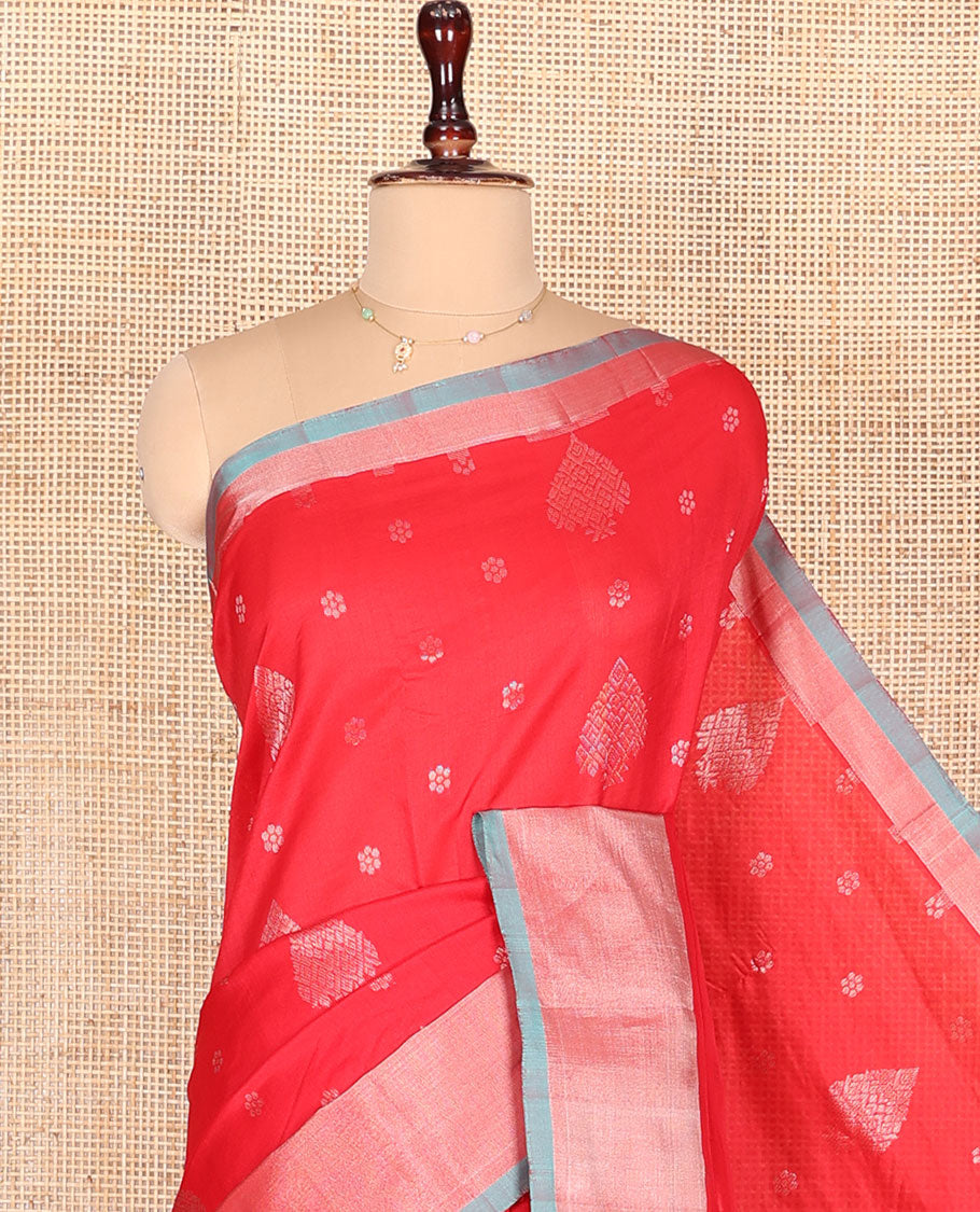 Red Kuppadam Cotton Saree, Gleamed Up with Zari Buttas All Over Its Body, Complemented by a Bavanji Border, Pallu of Intricate Designs, and Paired with a Contrast Blouse