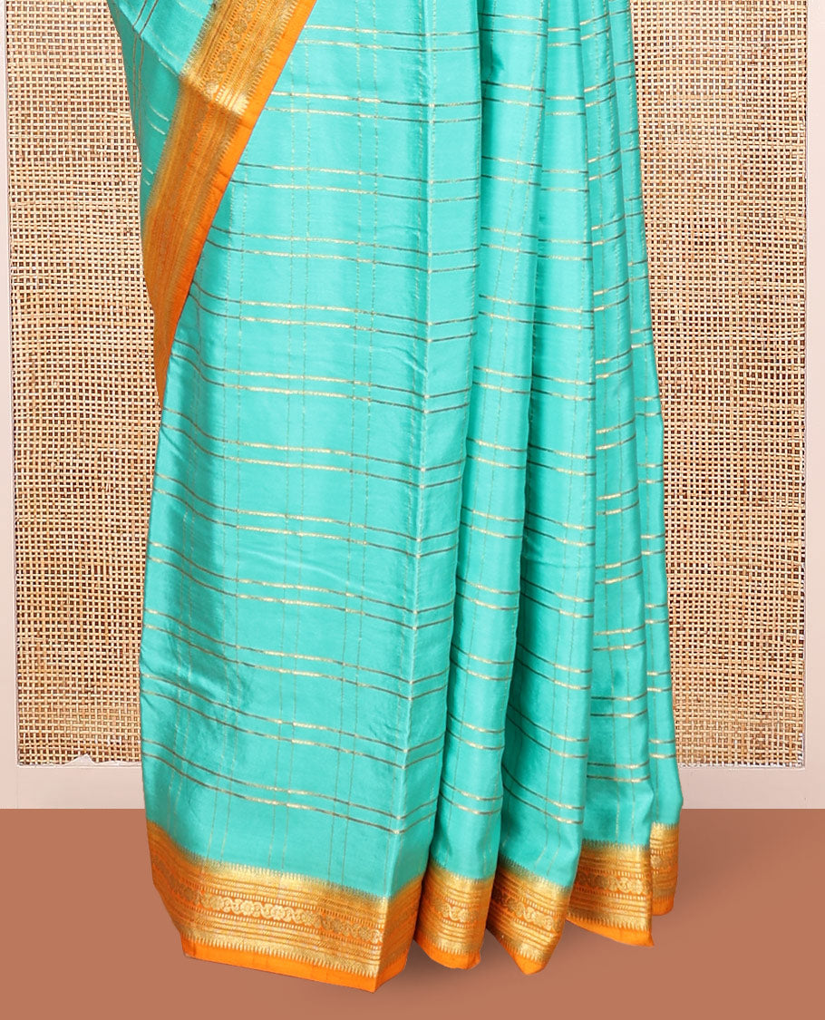 Blue Mysore Silk Saree, Gleamed up with Zari Checked Design on its Body, Complemented by Captivating Contrast Border of Traditional Zari Designs, Pallu of Tropical Flora and Flamingo Bird Designs, and Paired with a Contrast Blouse