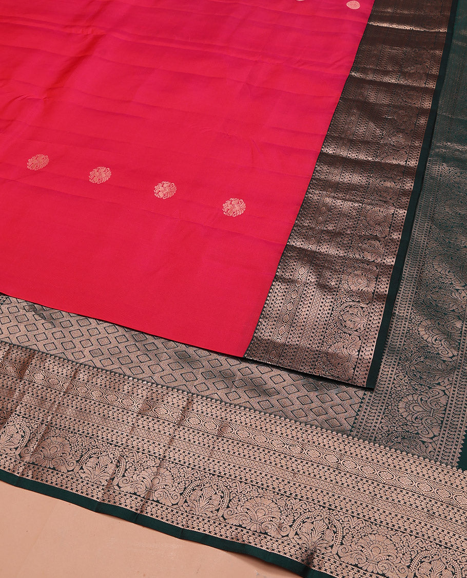 Red Vasundhara Silk Saree Accentuated with Zari Buttas All Over Its Body, Highlighted with a Contrast Border of Traditional Zari Designs, Pallu Delicately Woven with Jaal Designs, and Paired with a Contrast Blouse