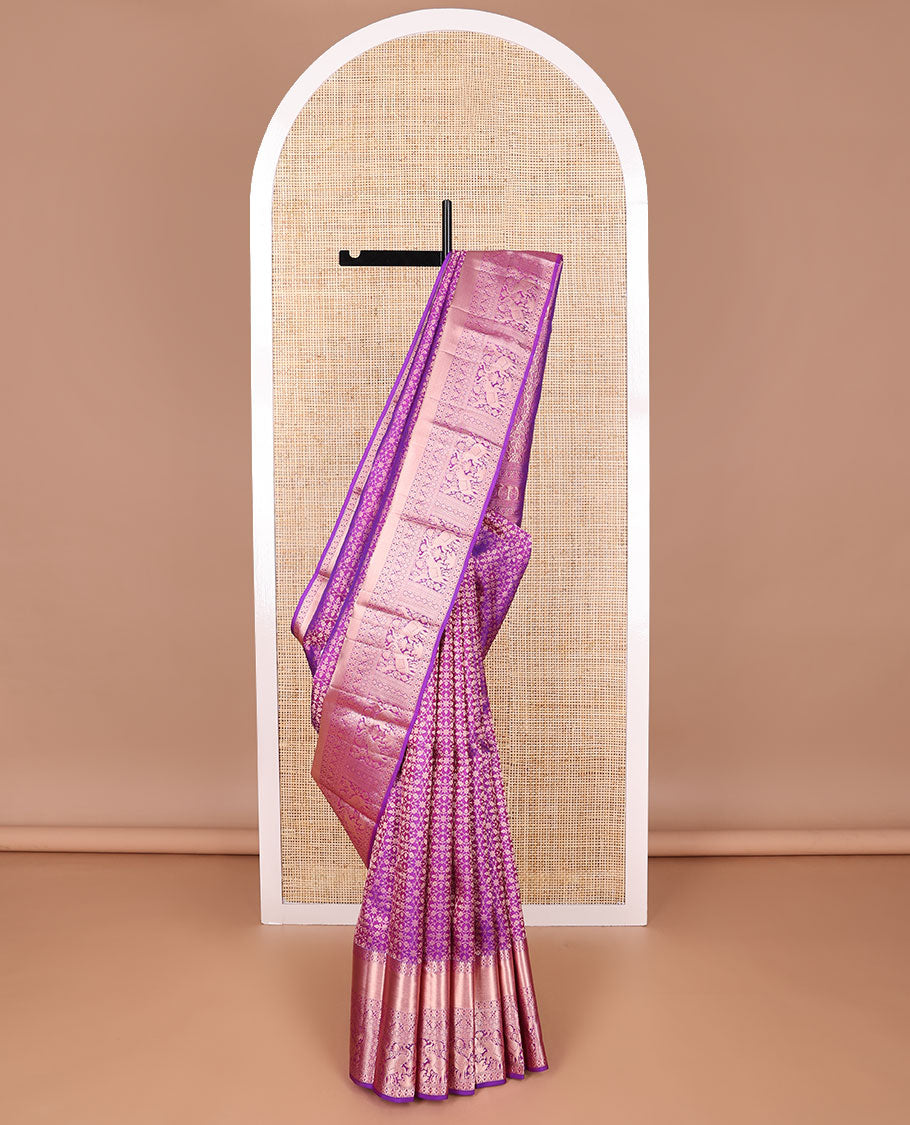 Purple jacquard kancheepuram silk saree with self border of intricate zari design & floral design pallu