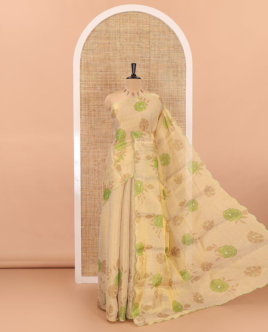 Gold and green rose motifs printed with mirror work tissue saree, scallop embroidered border, printed pallu, and a contrast blouse