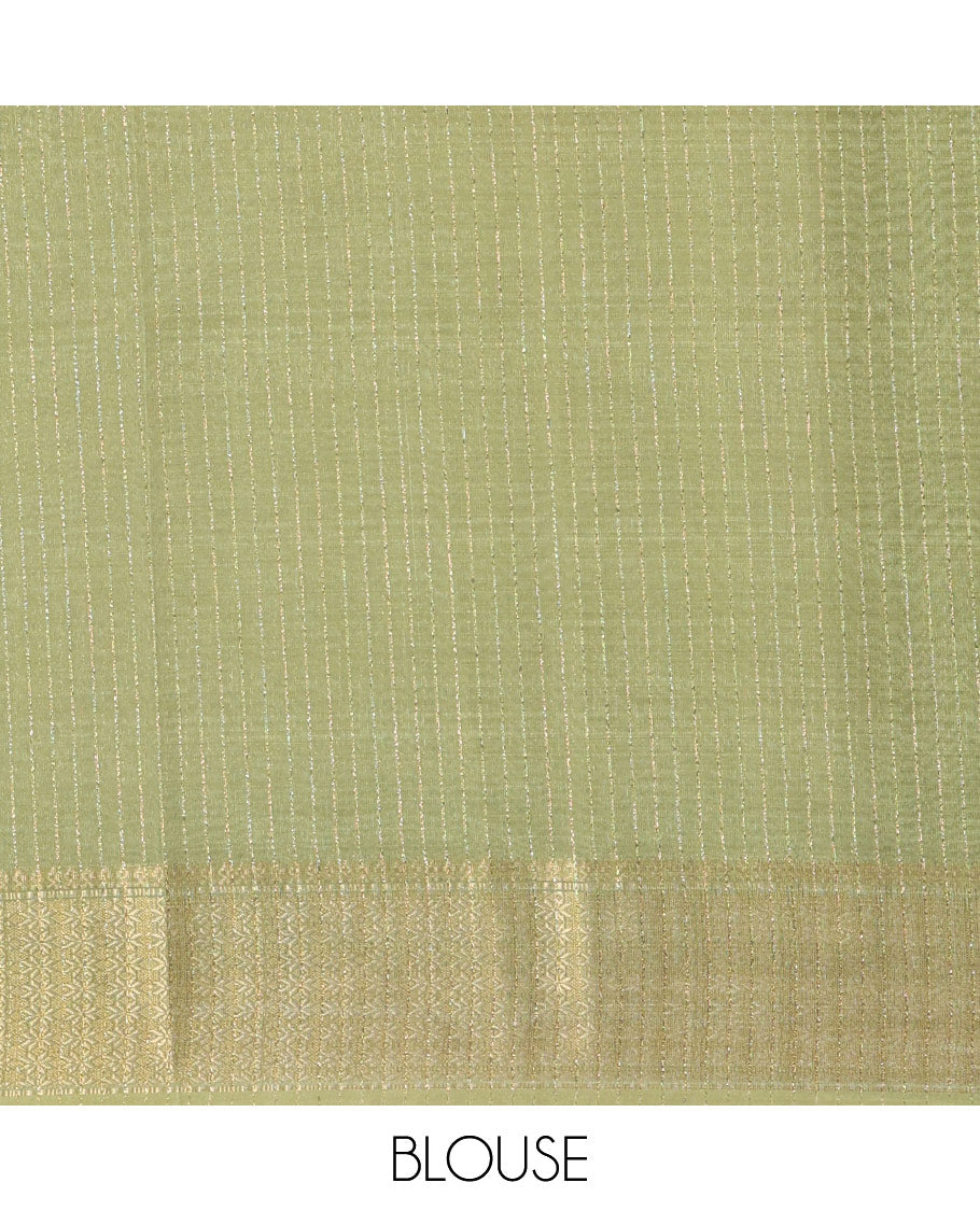 White and Green Dola Silk Saree Elevated with Vertical Zari Stripes All Over the Body, Complemented by a Contrast Border of Traditional Zari Designs, Self-Pallu of Stripes, and Paired with a Contrast Blouse