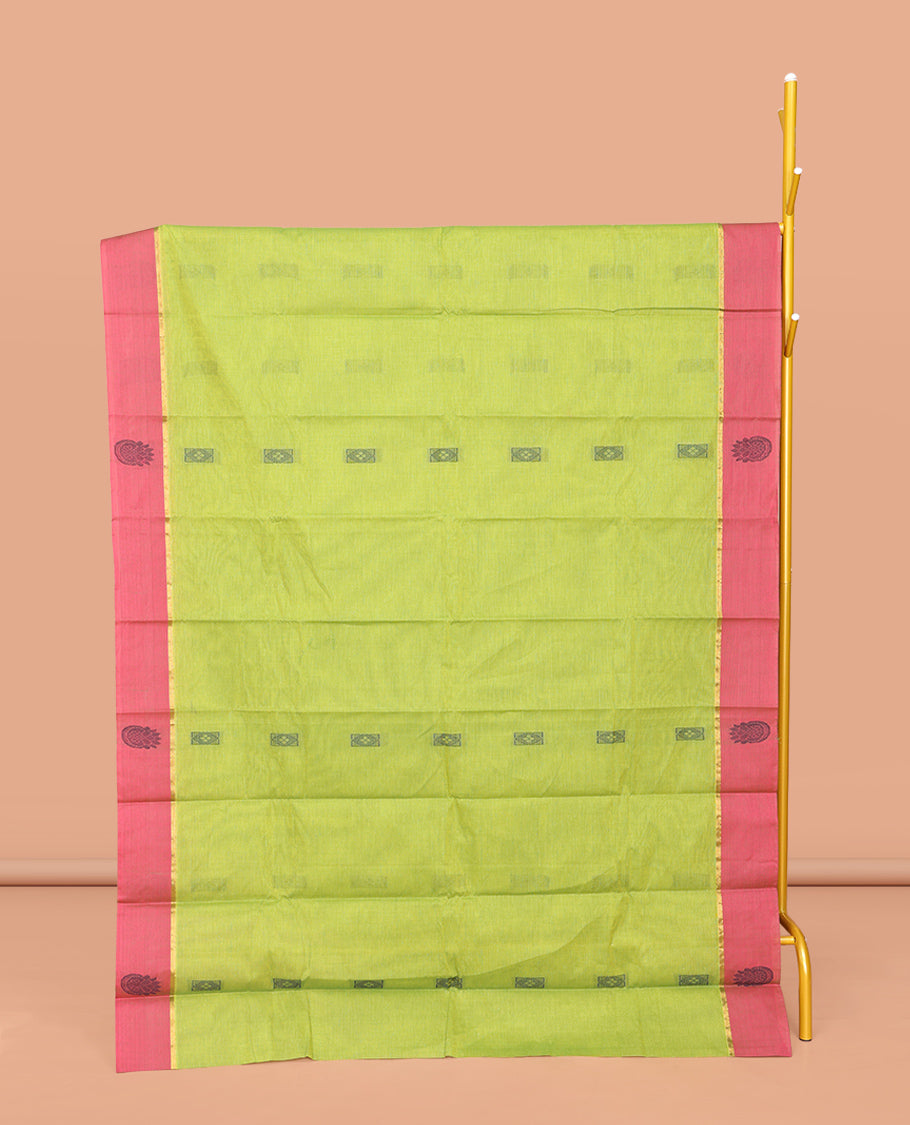 Leaf Green Kanchi Cotton Saree, Crafted with Buttas All Over Its Body, Complemented by Contrast Border, Pallu of Floral Designs, and Paired with a Matching Blouse