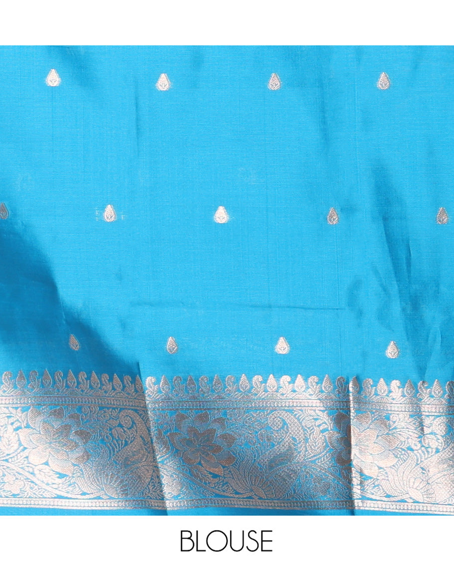 Borderless Peacock Blue Kanchi Silk Saree, Opulently Embellished with Zari Buttas, Intricate Pallu, and a Matching Blouse