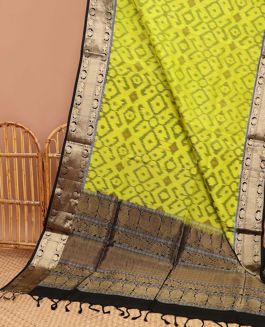 yellow ikkat style floral design soft silk saree with contrast zari border & traditional zari design pallu