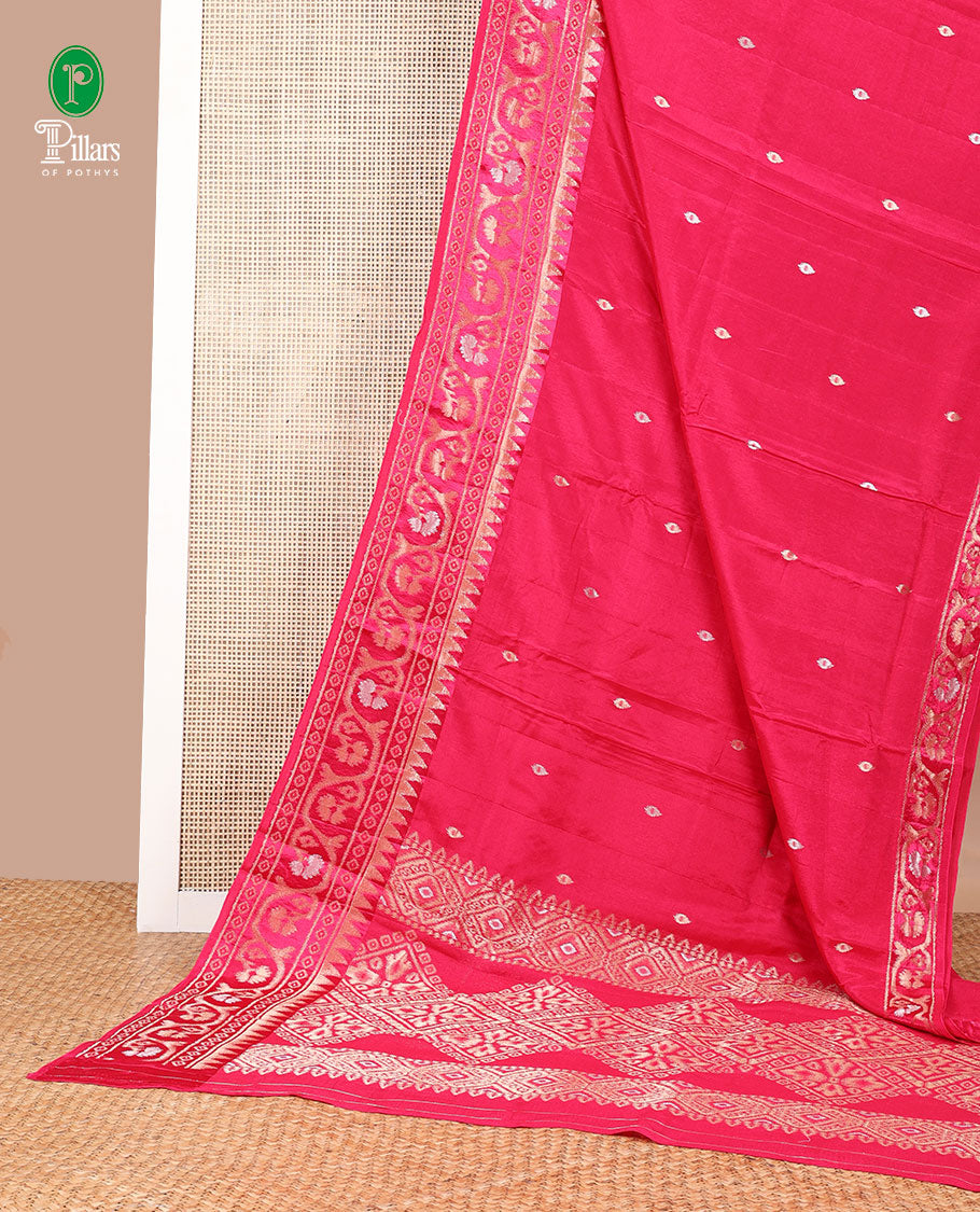 Rani pink zari butta dola silk saree with patola style design, temple border & rich pallu along with plain blouse