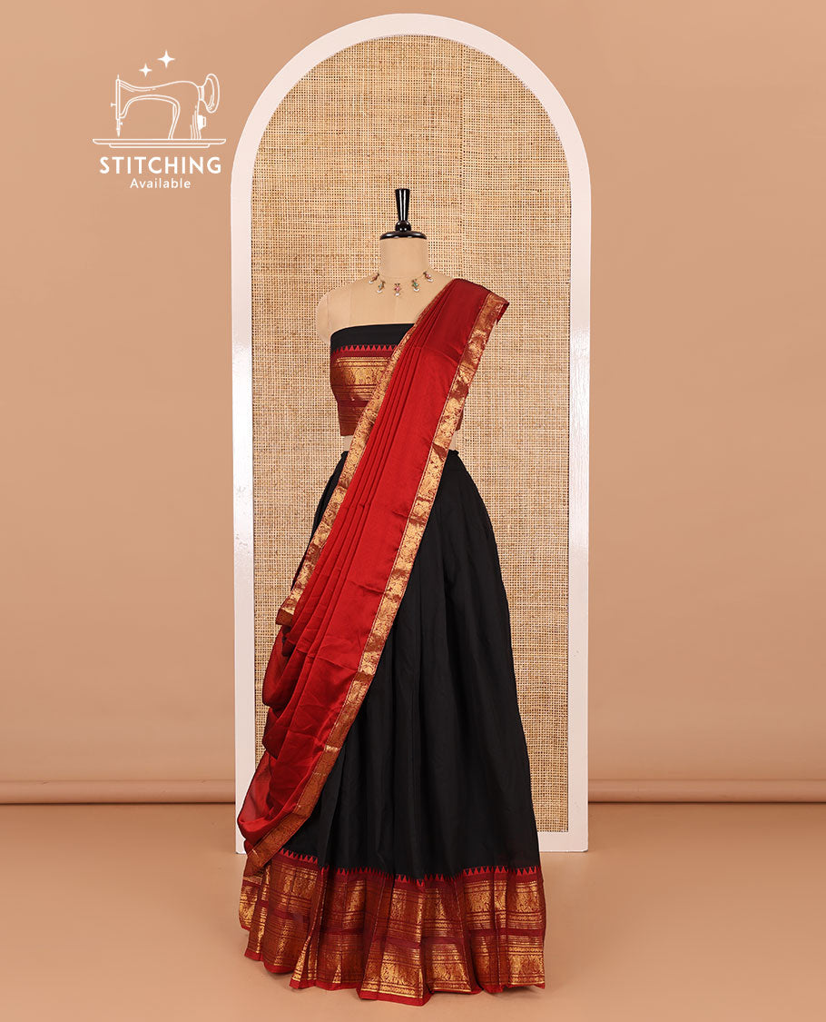 Black-red sungudi cotton half-saree, plain with contrast traditional zari varisai pettu bordered skirt, a matching blouse, and a zari bordered dhavani