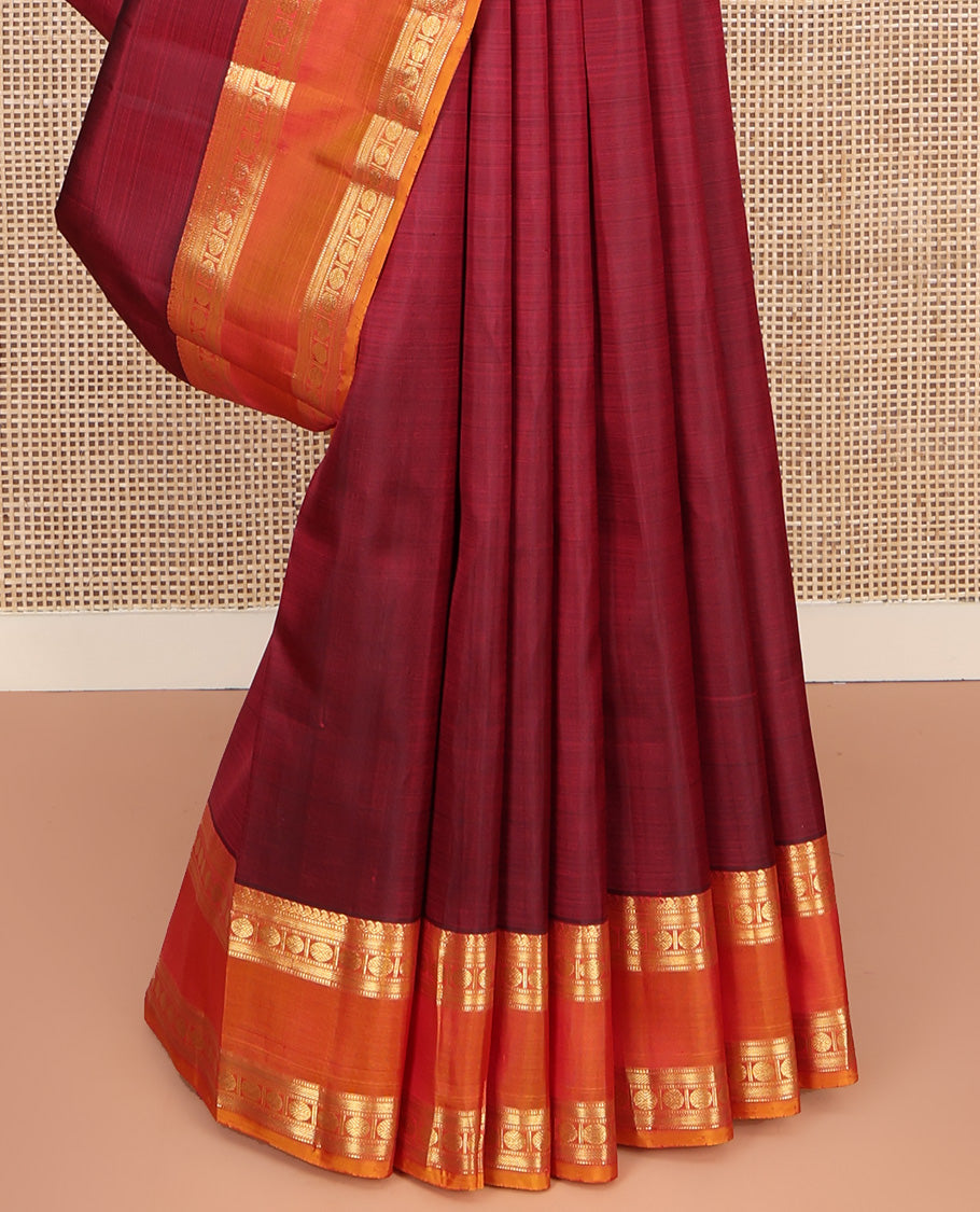 Red Kanchipuram Silk Saree, Enriched with Zari Buttas All Over Its Body, Complemented by Contrast Rettai Pettu Border of Manga Mokku, Muthu, Banaras, and Poun Designs, Grand Pallu, and Paired with a Contrast Blouse