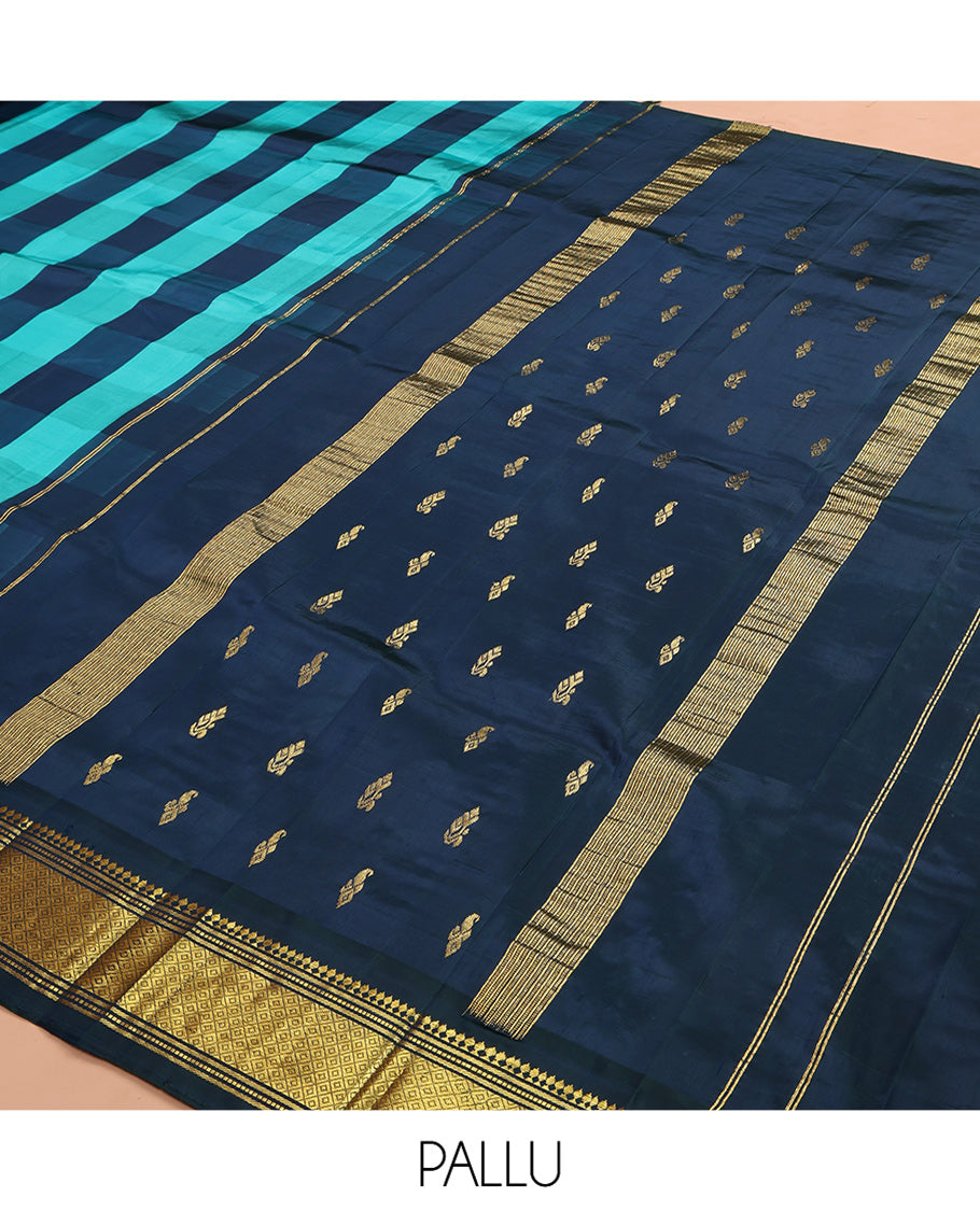 Blue Checked Kanchipuram Silk Saree, a Zari One-sided Border of Paneer Sombu, Banaras, Muthu, and Mayil Kann Designs, Pallu of Zari Designs, and No Blouse