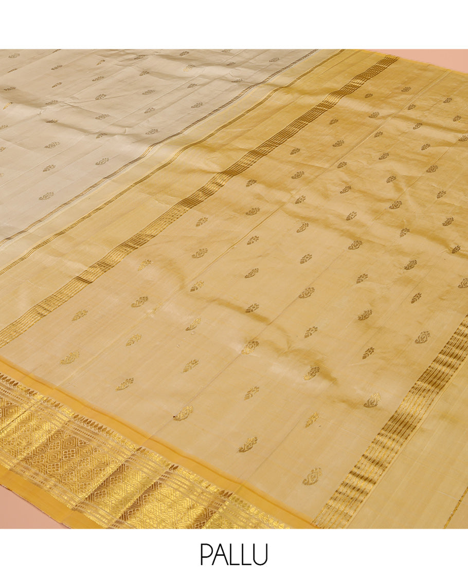 Sandal Kanchipuram Silk Saree, Subtly Sparkled with Zari Buttas, a Contrast One-Sided Border of Thilakam Mokku, Banaras, Muthu, and Jaal Designs, Zari Design Pallu, and No Blouse