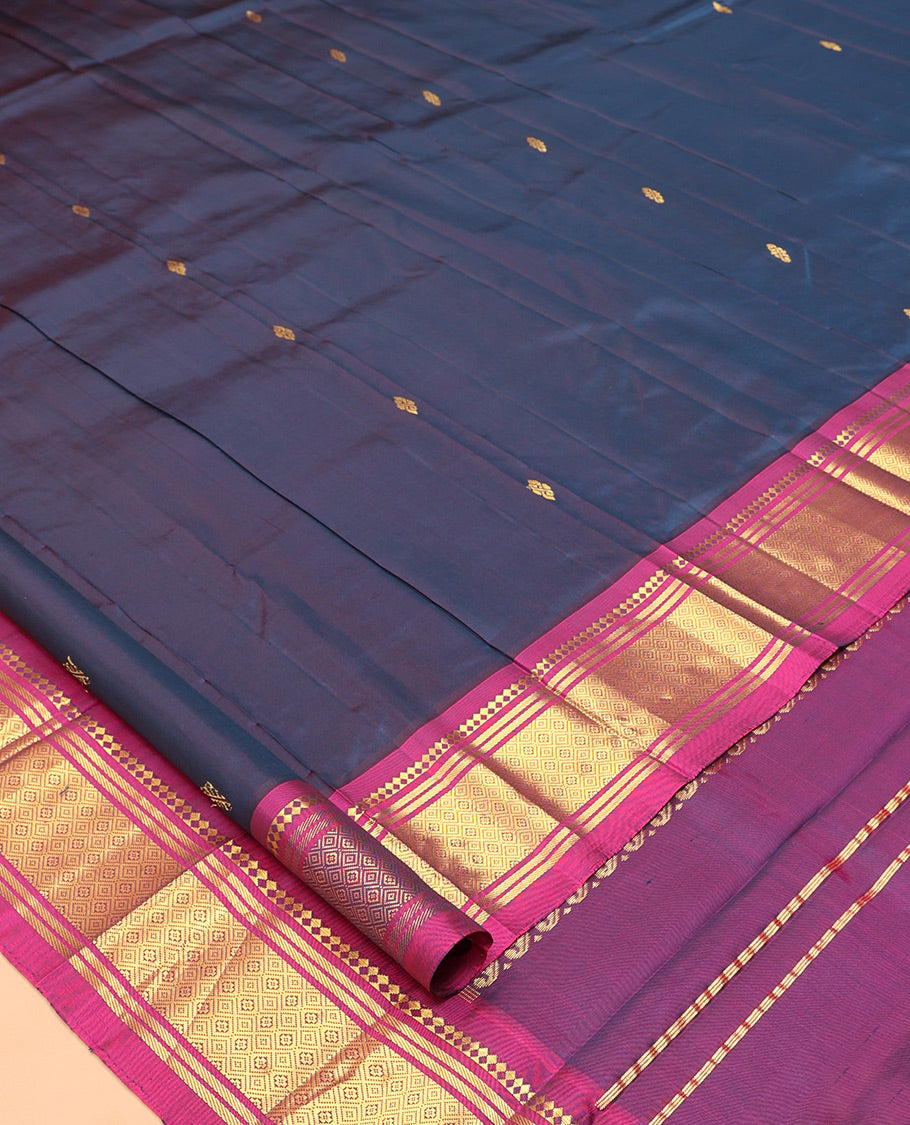 Blue Kanchipuram Silk Saree, Highlighted with Zari Buttas, Complemented by a Contrast Border of Panner Sombu, Banaras, and Jaal Design, Zari Design Pallu, and No Blouse