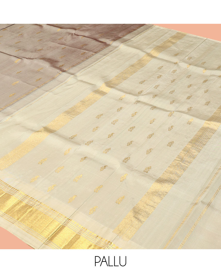 Grey Kanchipuram Silk Saree, Woven with Zari Buttas, a Contrast One-Sided Border of Panner Sombu, Banaras, Muthu, and Mayil Kann Designs, a Zari Design Pallu, and No Blouse