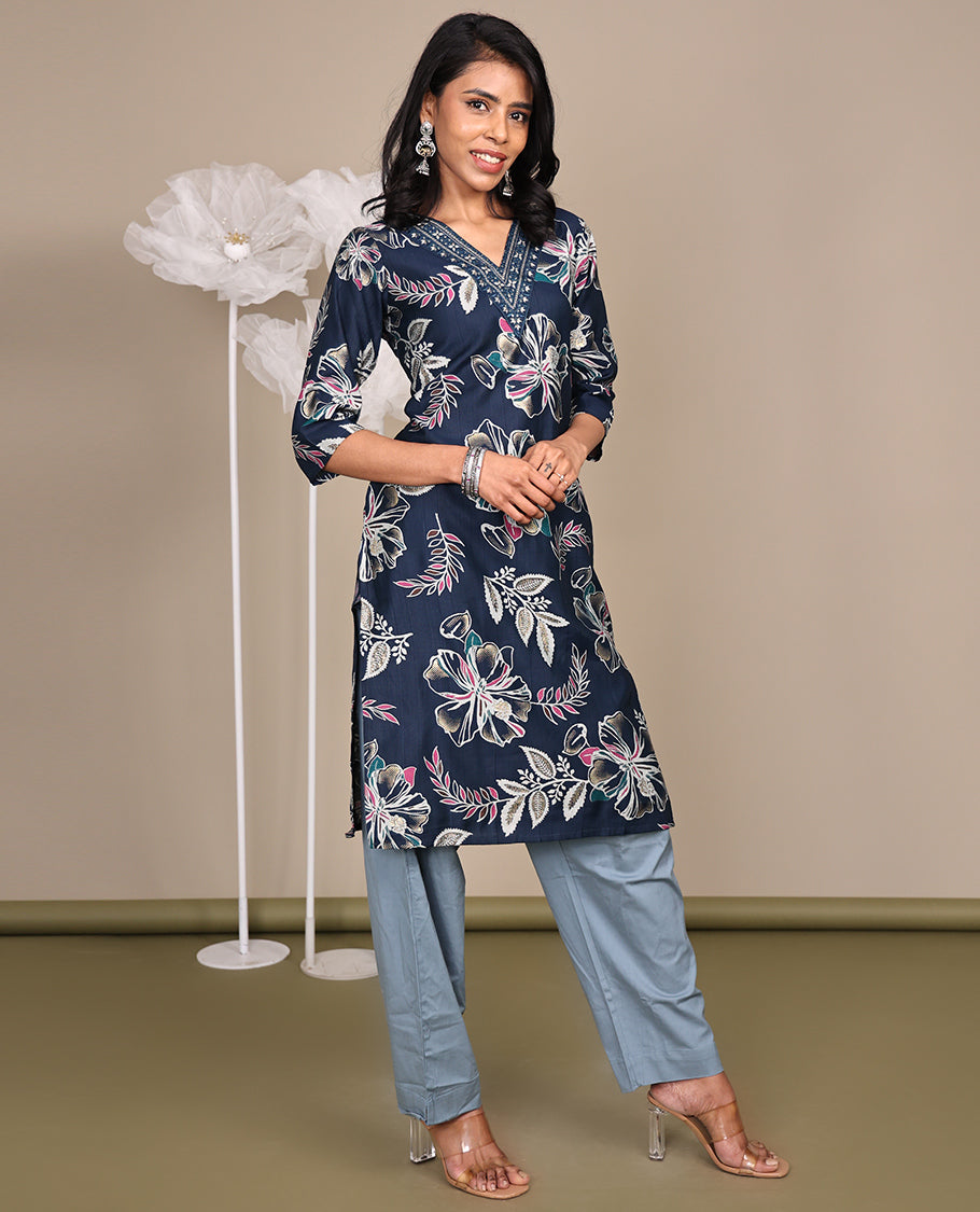 Blue Floral Printed Knee-Length Cotton Kurti, Prettified with a V-Neckline, 3/4 Sleeves, and a Straight-Cut Length