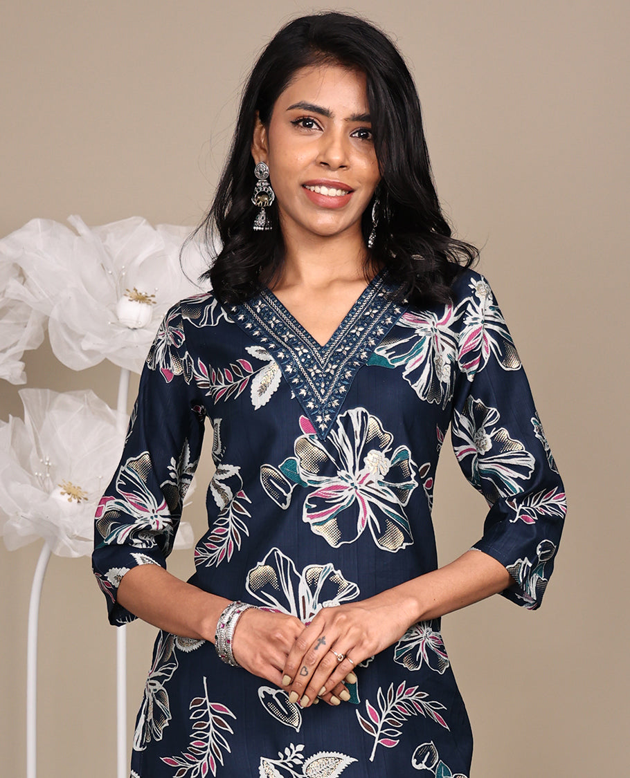 Blue Floral Printed Knee-Length Cotton Kurti, Prettified with a V-Neckline, 3/4 Sleeves, and a Straight-Cut Length