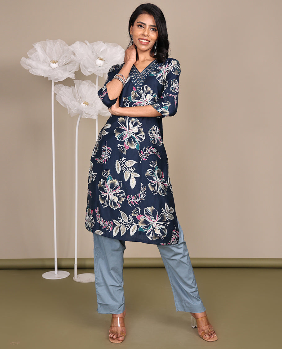 Blue Floral Printed Knee-Length Cotton Kurti, Prettified with a V-Neckline, 3/4 Sleeves, and a Straight-Cut Length