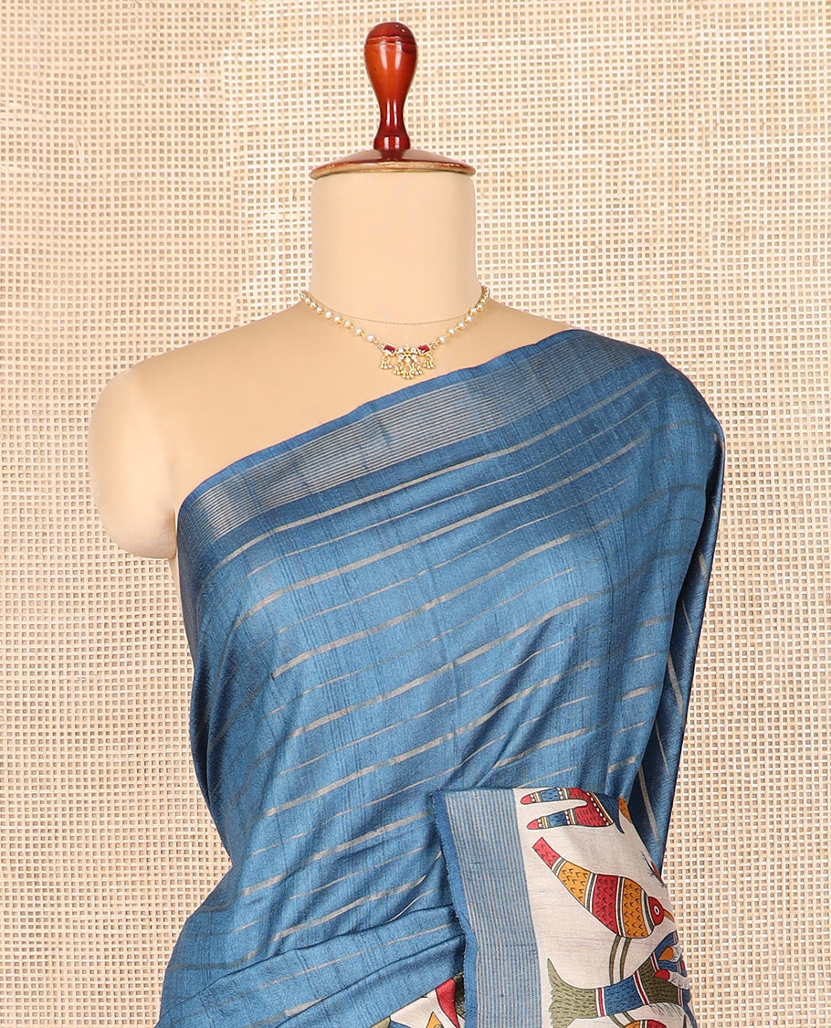 Blue striped and Madhubani-style tussar saree, zari striped border, and pallu of stripes and Madhubani print