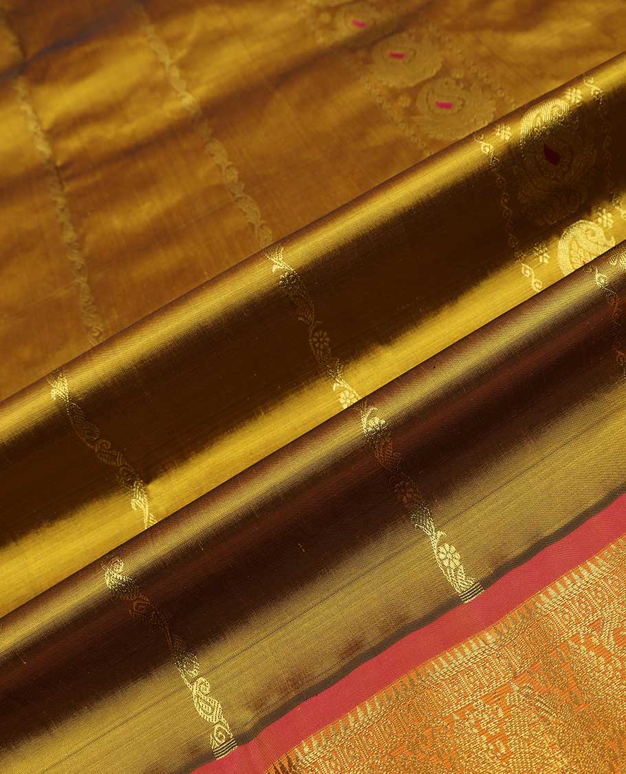 Green puresilk halfsaree, zari design skirt, contrast blouse, and border features rekku, diamond, arumbu manga, jaal design, and floral design dhavani