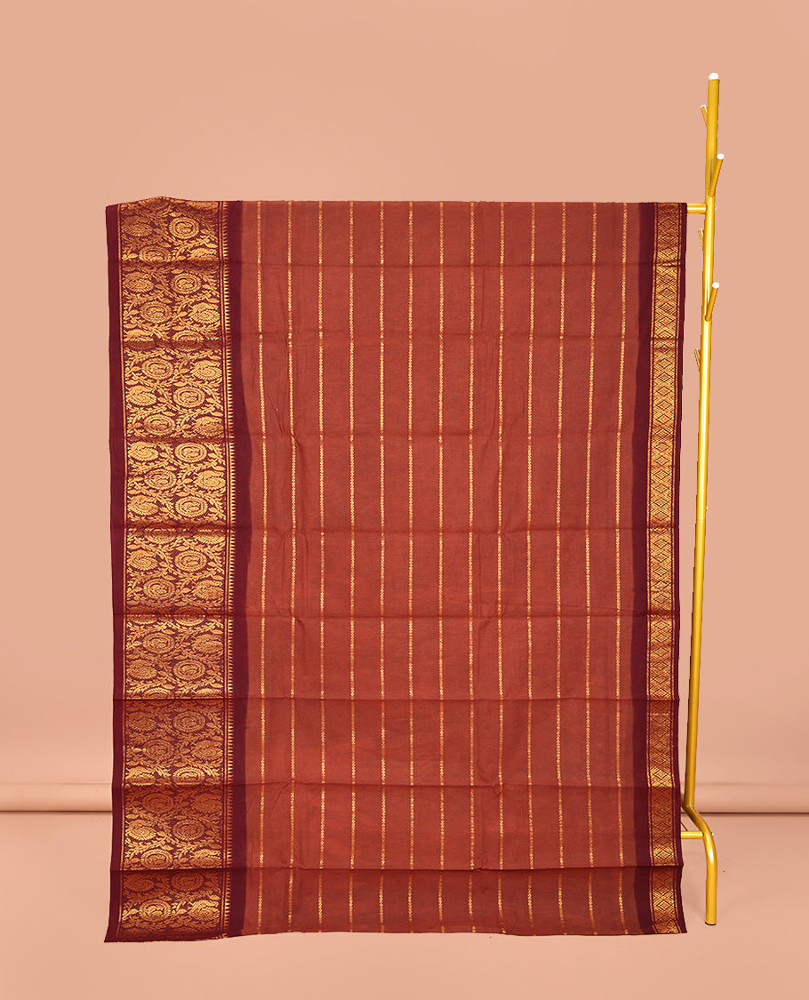 Rust Sungudi Cotton Saree, Embellished with Stripes on Its Body, Complemented by a Contrast Border of Round Peacock and Floral Vine Designs, Zari Striped Pallu, and Has No Blouse