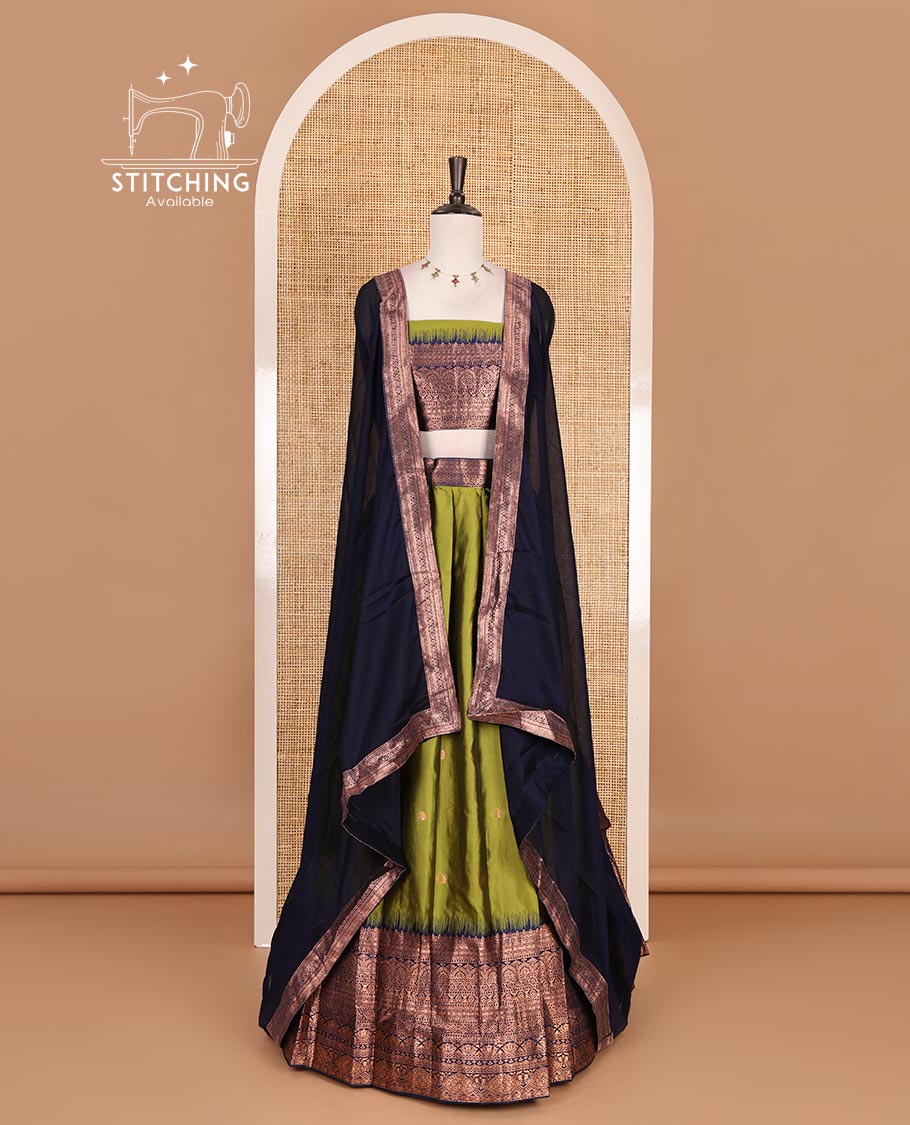 Parrot Green taffeta silk half saree, zari buttas with contrast navy blue traditional zari border, matching zari blouse, and contrast plain zari border dhavani