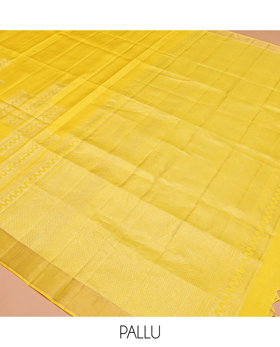 Yellow Mayuri Soft Silk Saree, Subtly Sparkled with Zari Designs All Over Its Body, Highlighted by Zari Border, Pallu of Ara Maadam Designs, and Paired with a Matching Blouse