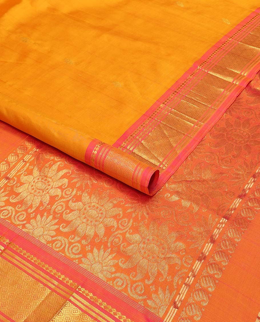 Orange buttas kancheepuram silk saree with contrast intricate zari design border & floral zari design pallu