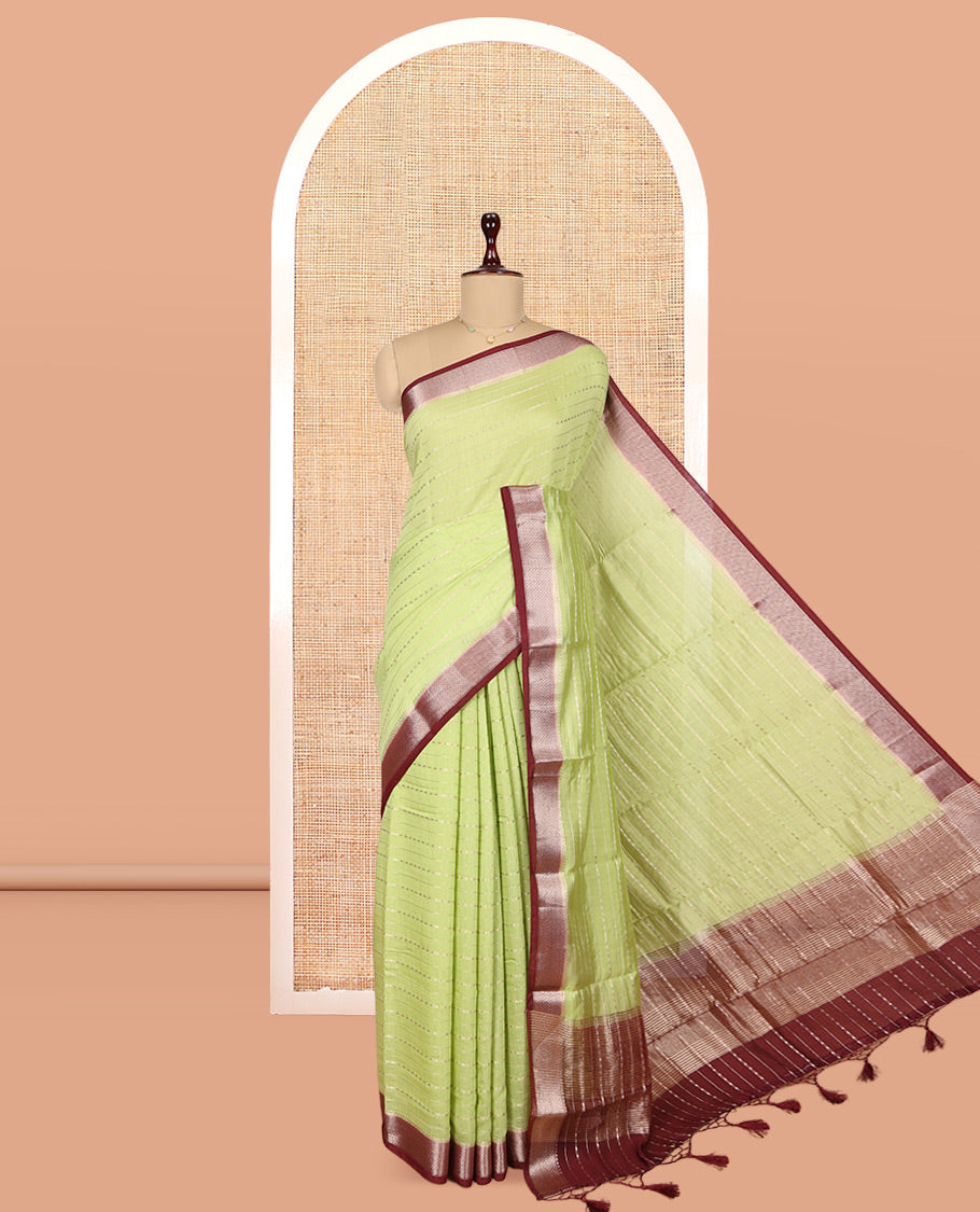 Green Assam Silk Saree, Elevated with Zari Stripes, Complemented by Contrast Zari Border, Zari Woven Pallu, and Contrast Blouse