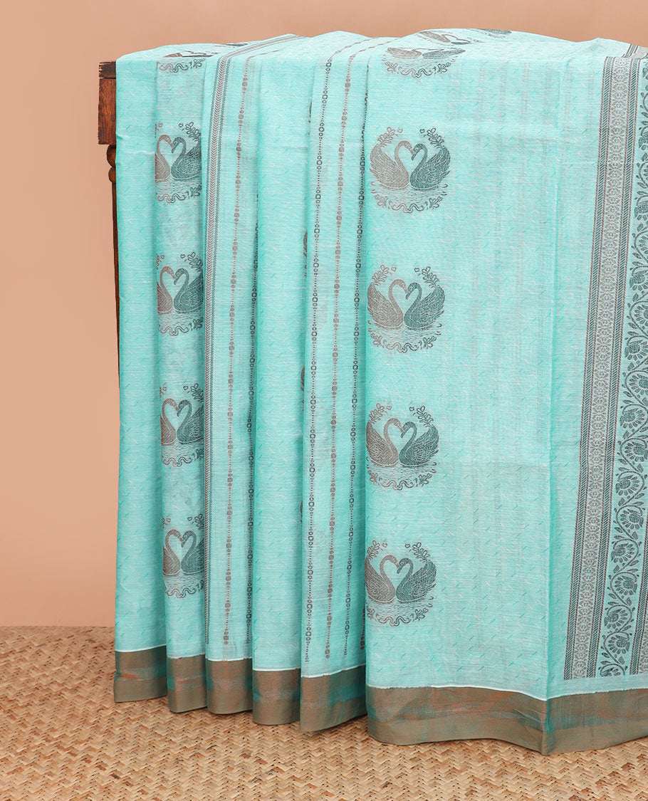 Pale blue buttas and striped coimbatore cotton saree, contrast plain border and pallu of Swan motifs