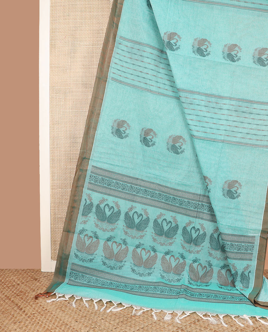 Pale blue buttas and striped coimbatore cotton saree, contrast plain border and pallu of Swan motifs