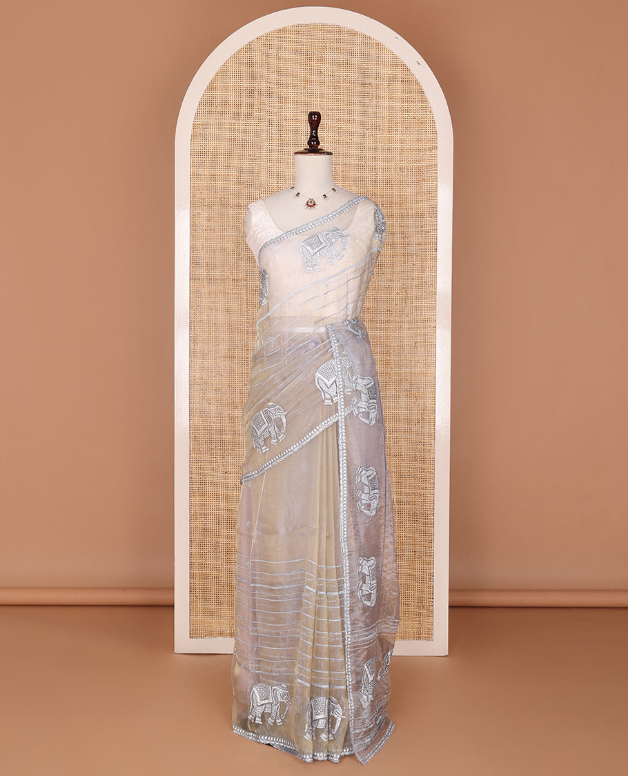 Cream stone embroidered elephant motifs designer saree, scallop crystal stone border & pallu of elephant embroidery