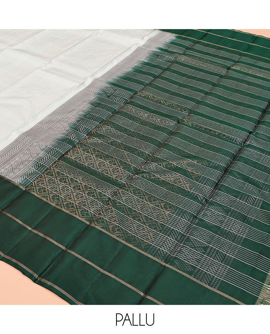 Pale Blue Kanchipuram Silk Saree, Woven with Checks, a Contrast Yaanai-Peacock Buttas Border, Intricate Pallu, and a Contrast Blouse