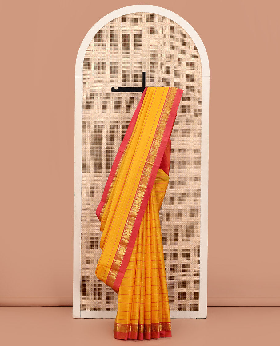 Yellow Kanchipuram Silk Saree Bedecked with Resham Threads Neli Stripes, Elevated with Contrast Kal Erangina Border Featuring Manga, Muthu, and Mayil Designs, Sparsely Woven Pallu, and Paired with a Contrast Blouse