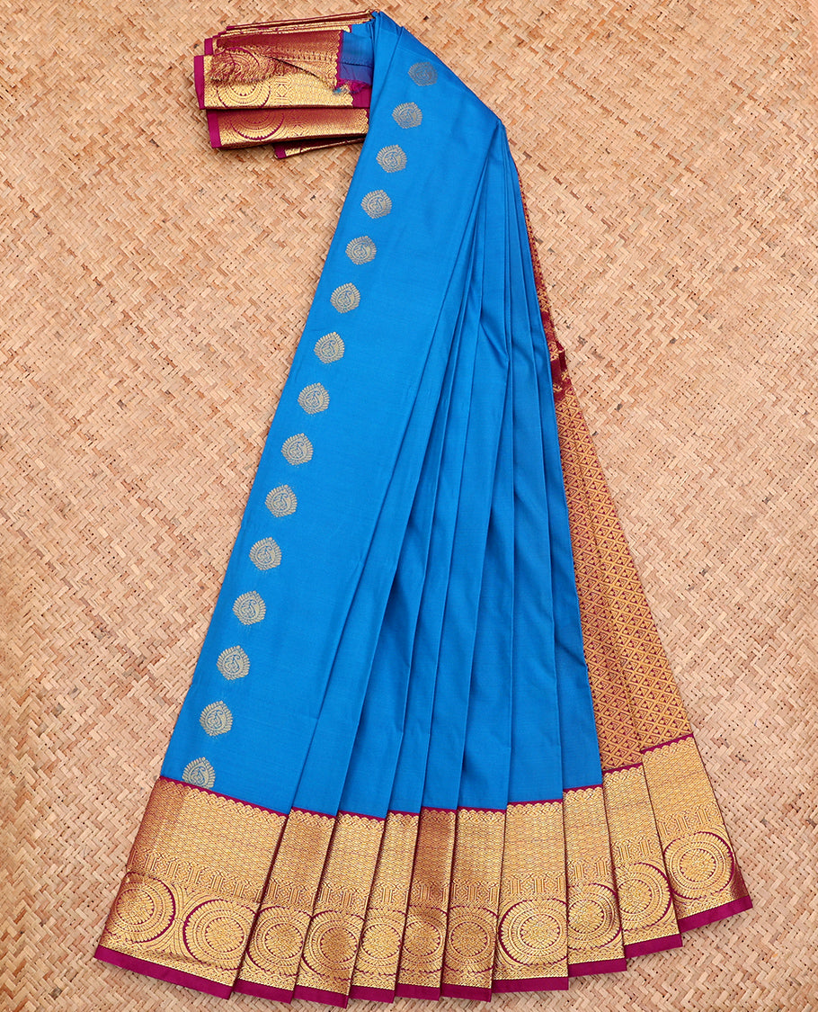 Blue Budget Silk Saree, Adorned with Zari Buttas All Over Its Body, Complemented by a Contrast Traditional Zari Design Border of Chakram Designs, Grand Jaal Pallu, and Paired with a Contrast Blouse