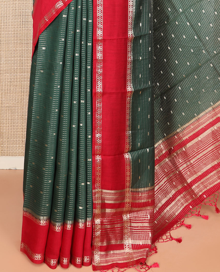 Dark Green Assam Silk Saree Woven with Zari Buttas and Stripes, Complemented by a Contrast Traditional Zari Design Border, a Captivating Pallu Featuring Zari Designs, and Paired with a Contrast Blouse