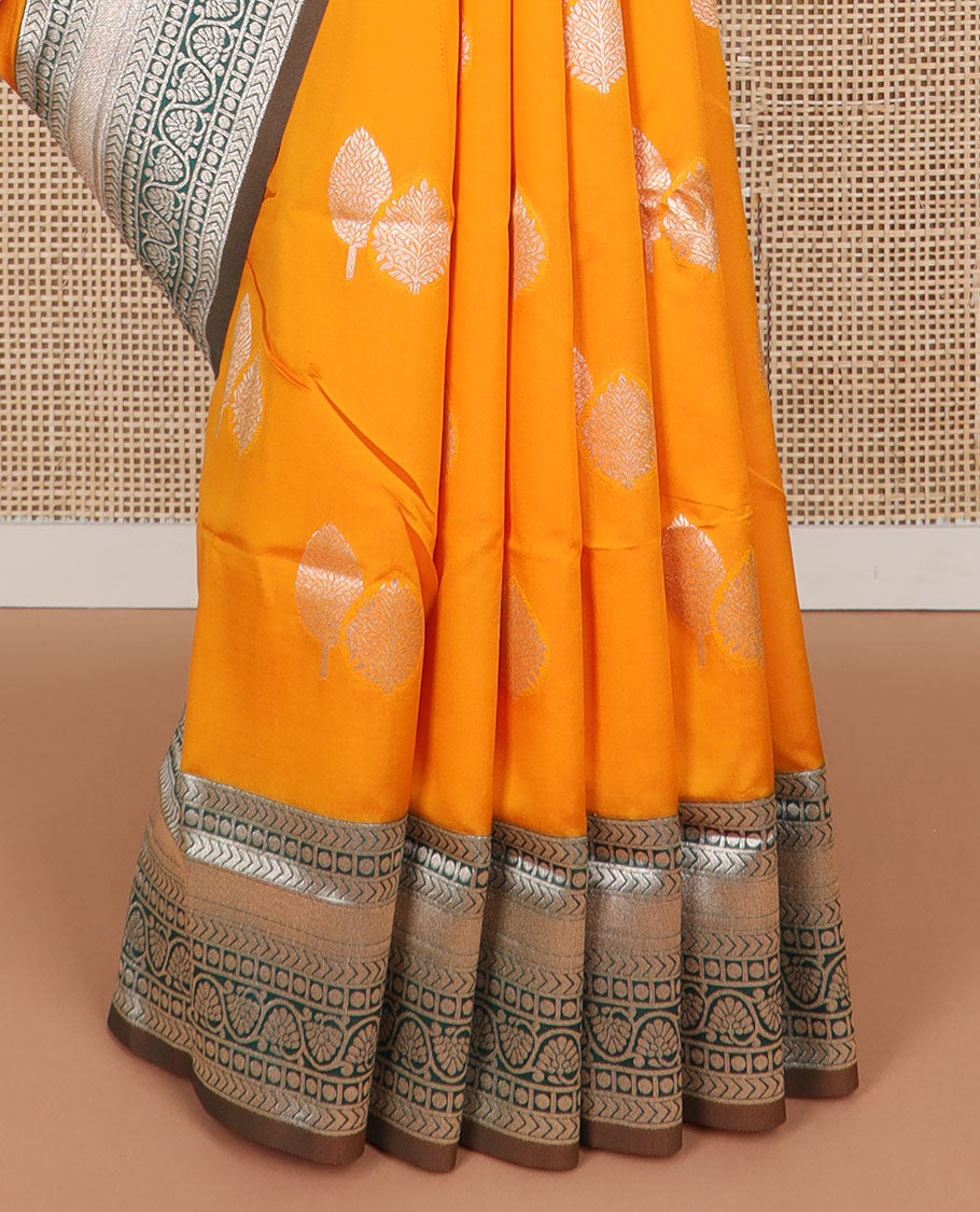 Orange leaf motifs butter silk saree with contrast intricate zari design border & argyle design pallu