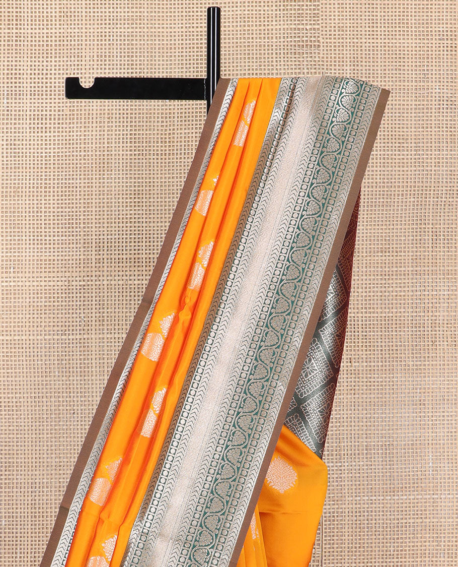 Orange leaf motifs butter silk saree with contrast intricate zari design border & argyle design pallu
