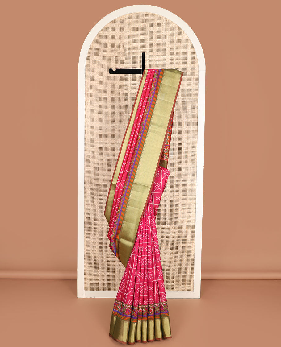 Pink butta enclosed checked semi-banaras patola silk saree, contrast zari border of ikkat design, and pallu steeped with geometric patterns