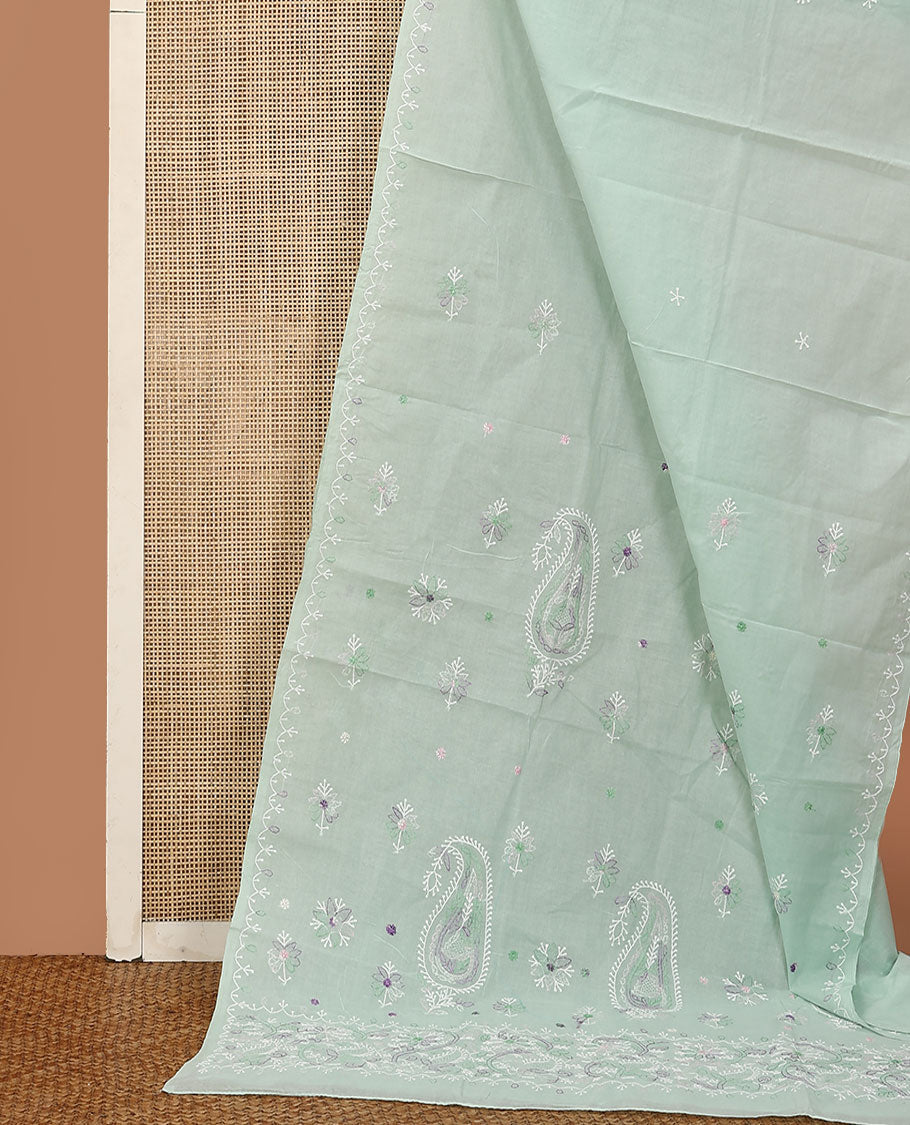 Pale green colorful embroidered buttas Lucknowi chikankari saree, thread embroidered border, and floral-paisley motifs embroidered pallu