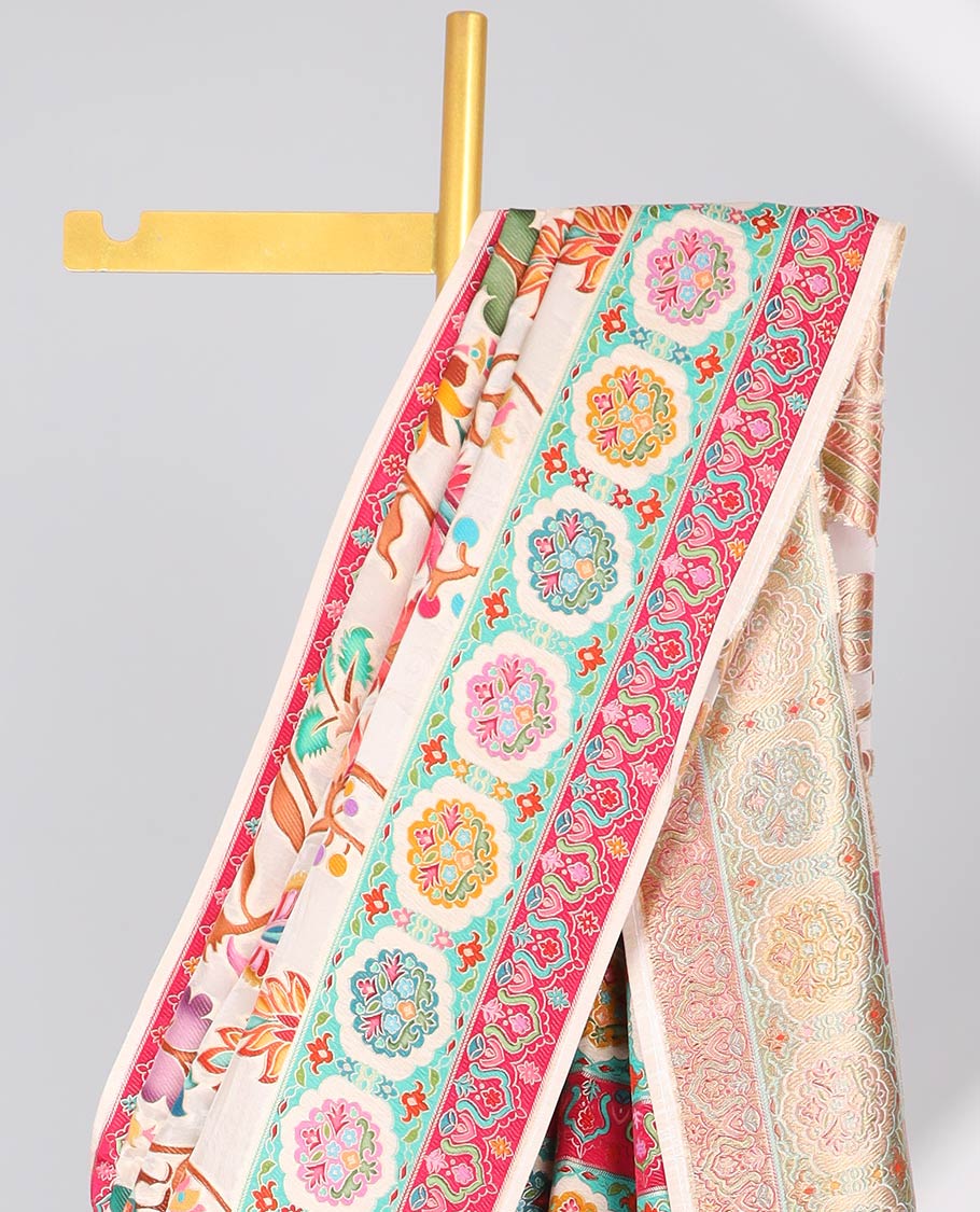 Cream floral vine design semi-banaras dola silk saree with contrast border and intricate design pallu