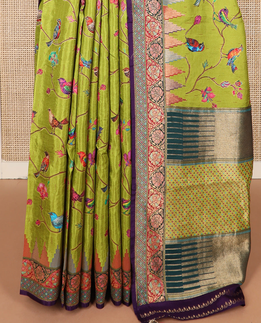 Green floral vine, and birds printed dola silk saree, contrast meenakari floral creeper border, and temple motif pallu