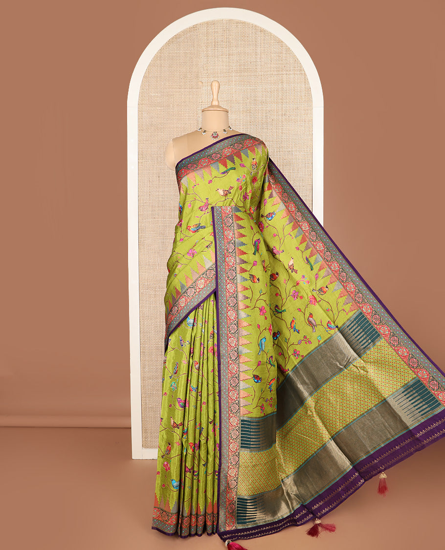 Green floral vine, and birds printed dola silk saree, contrast meenakari floral creeper border, and temple motif pallu
