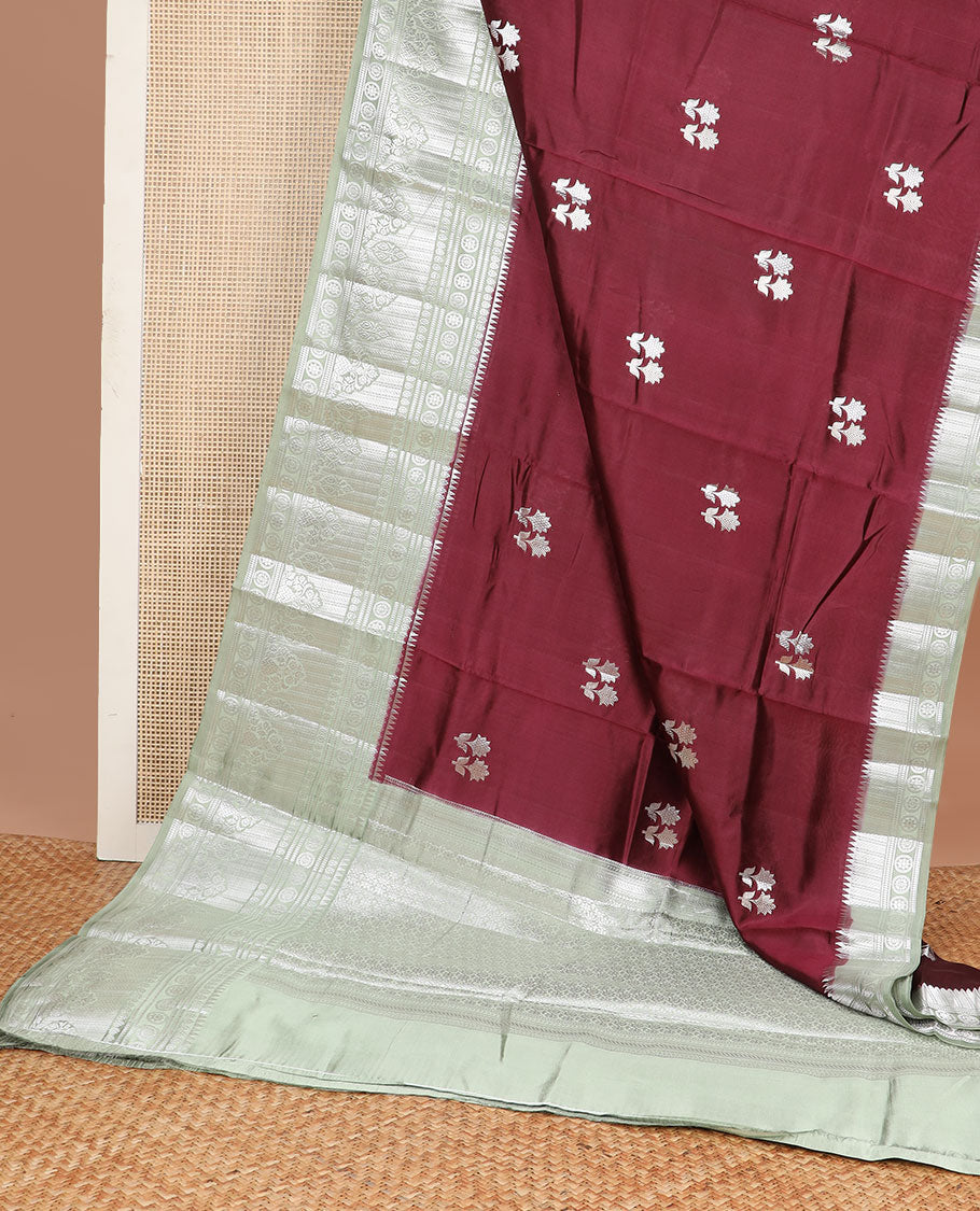 Maroon motifs raw mango silk saree with contrast zari design & floral design pallu