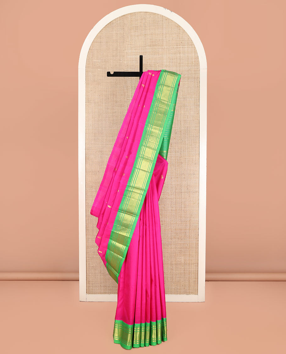 Pink Kanchipuram Silk Saree, Spotlighted with Zari Buttas on Its Body, Complemented by a Contrast One-Sided Korvai Border of Rekku, Banaras, and Mayil Kann Designs, Pallu Steeped with Zari Designs, and Comes Without a Blouse