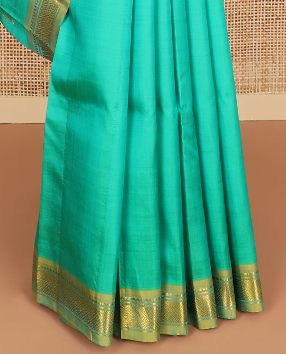 Sea blue buttas kancheepuram silk saree with contrast intricate zari design border & floral zari design pallu