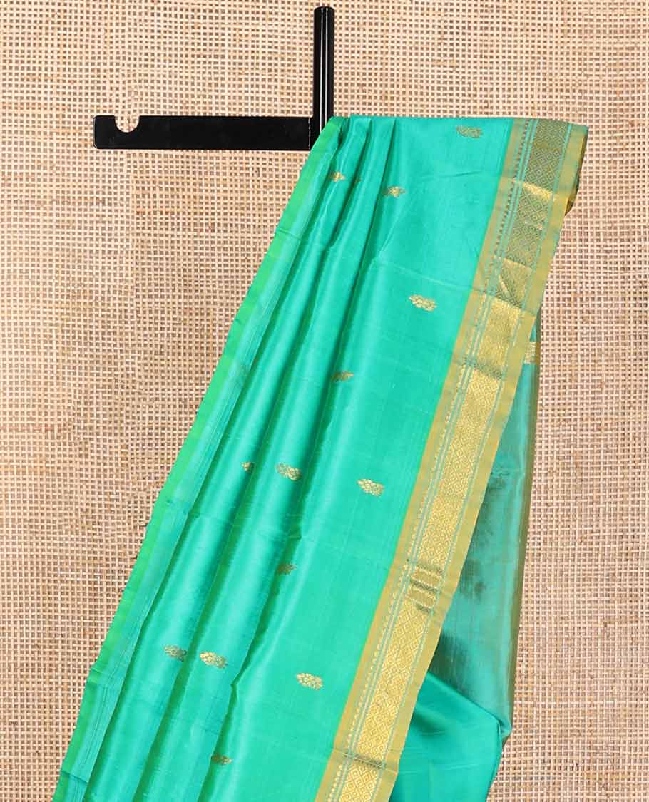 Sea blue buttas kancheepuram silk saree with contrast intricate zari design border & floral zari design pallu