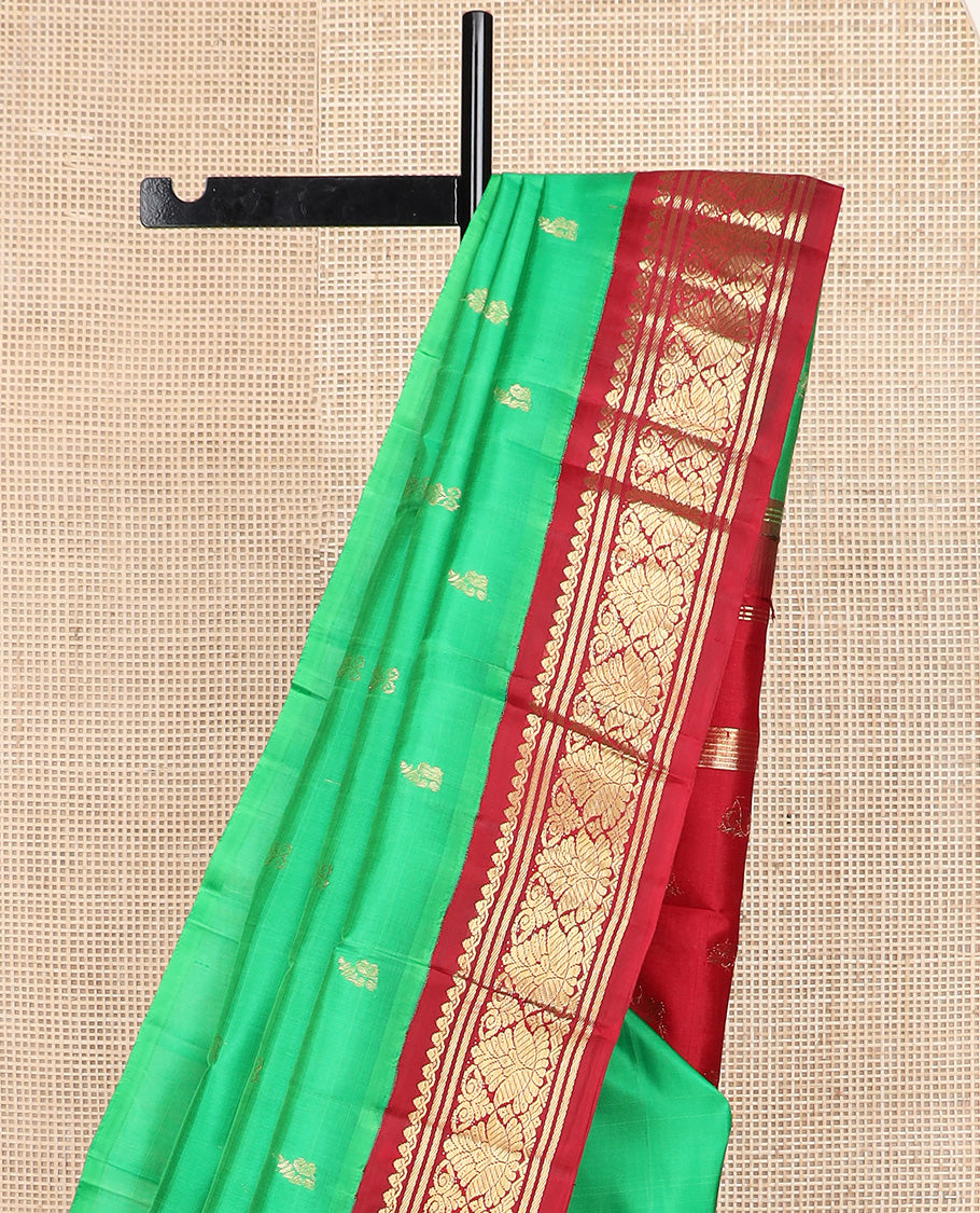 Green zari buttas Kanchipuram silk saree, contrast korvai one-sided zari border, and zari design pallu