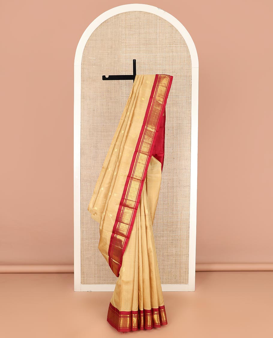 Sandal Kanchipuram Silk Saree Sparsely Sparkled with Zari Buttas All Over Its Body, Complemented by a Contrast One-Sided Korvai Border of Traditional Designs, Pallu of Zari Designs, and Comes Without a Blouse