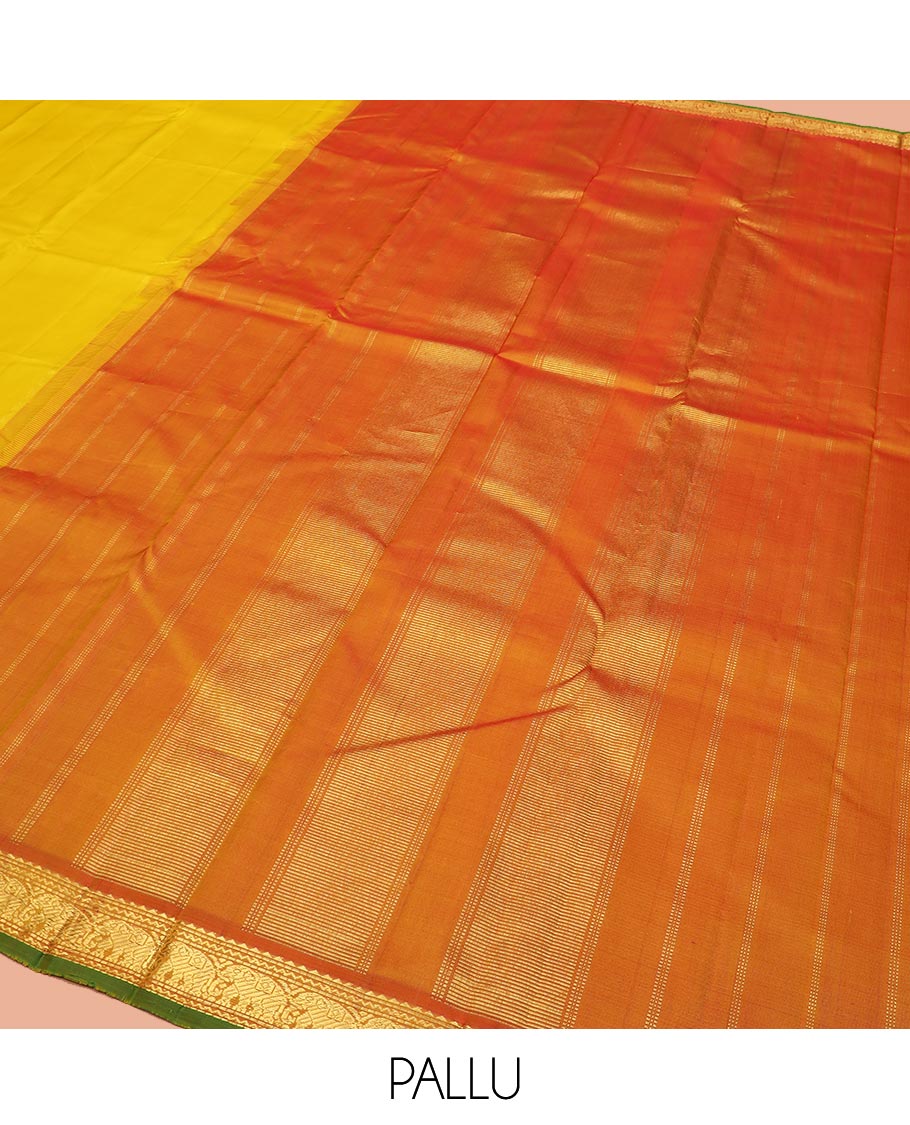 Yellow Plain Kanchipuram Silk Saree, Complemented by Contrast Border of Rekku, Neli, and Yaanai Designs, Pallu of Zari Designs, and Paired with a Contrast Blouse